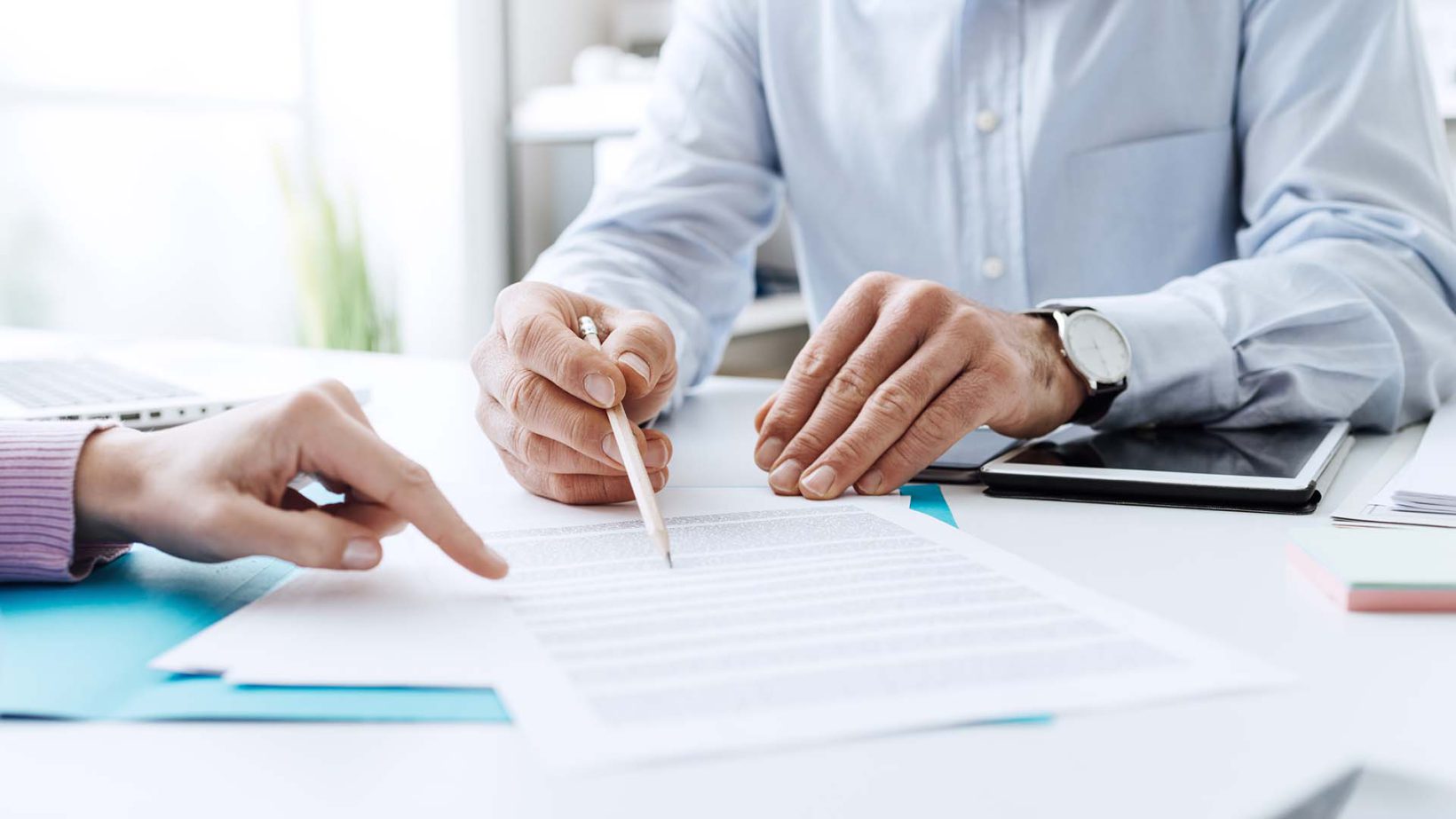 A person delivering secretarial services.
